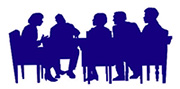 Silhouette of a council meeting in a board room.